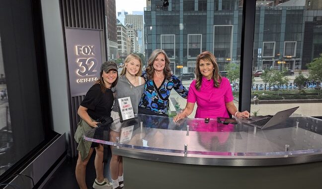 Kelly with host Sylvia Perez and WFLD staff